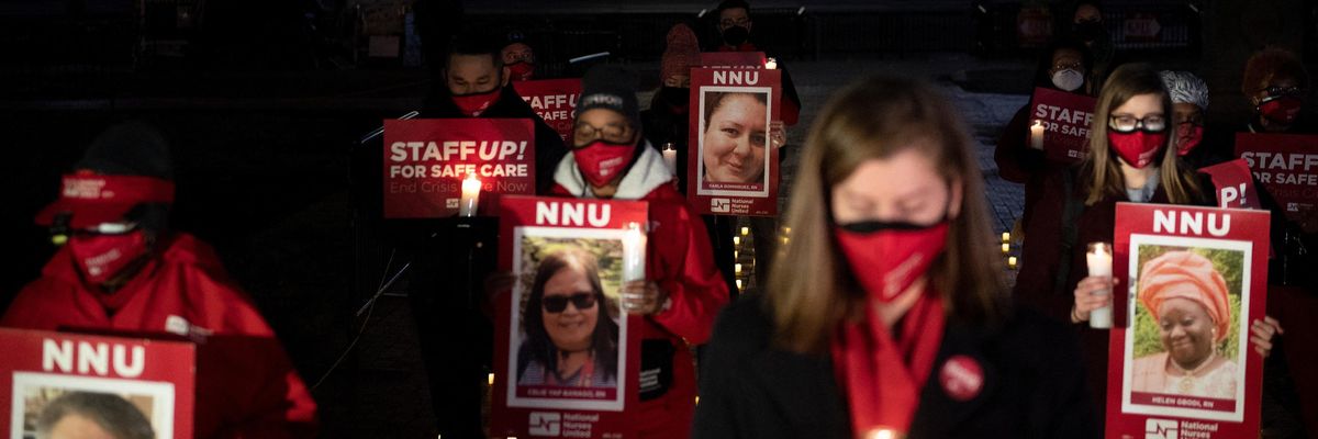 Nurses hold a vigil outside of the White House