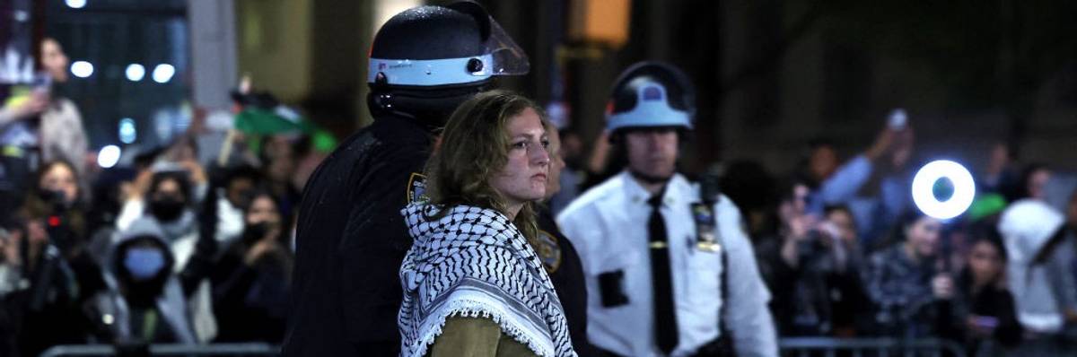 NYPD officers arrest a Columbia University student opposed to the genocide in Gaza