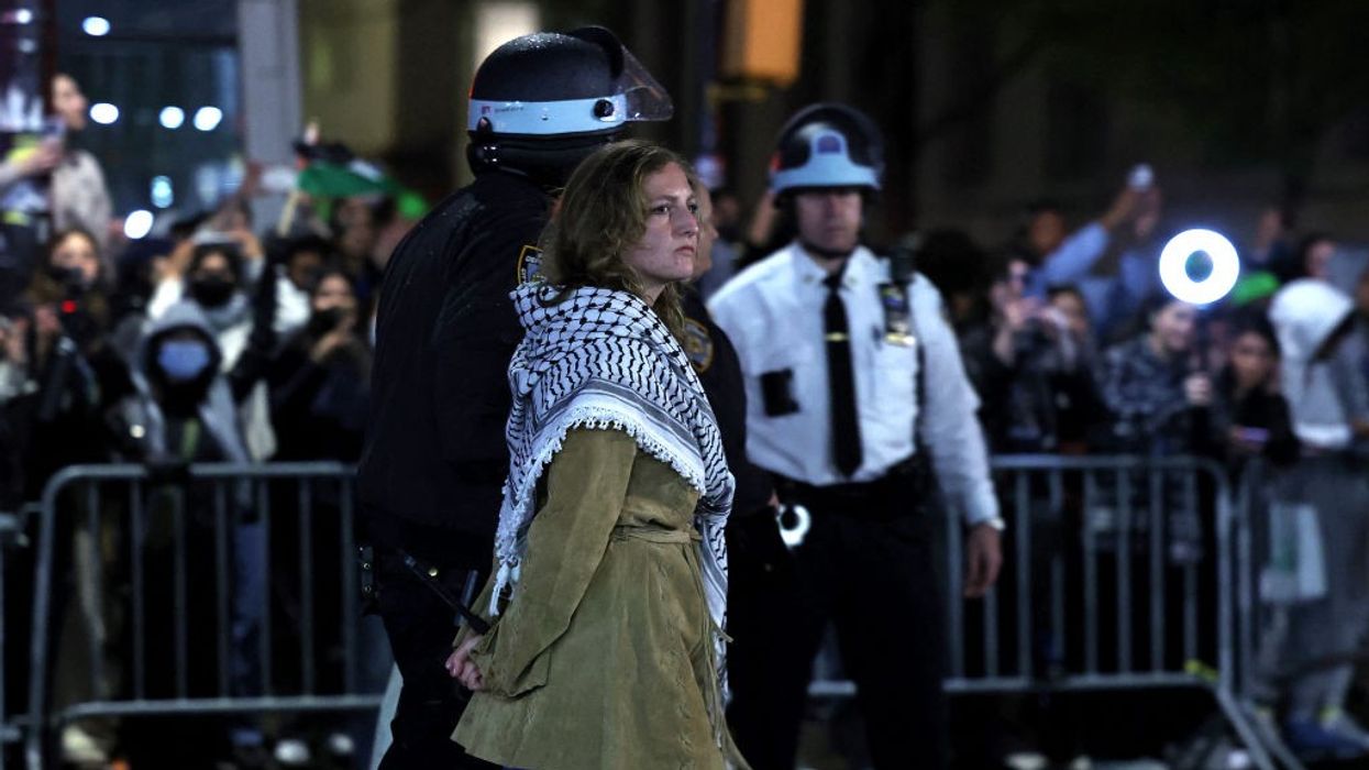 NYPD officers arrest a Columbia University student opposed to the genocide in Gaza