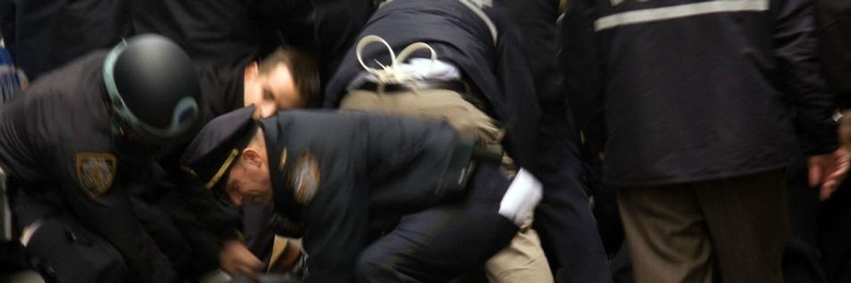 NYPD officers arresting an Occupy Wall Street protester in November 2011