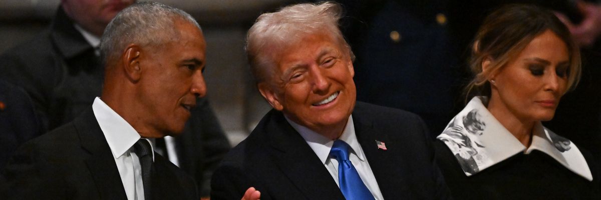 Obama whispers to a laughing Trump.