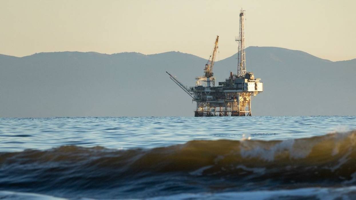 Offshore oil platform with Santa Cruz Island in the background, Santa Barbara Channel, California