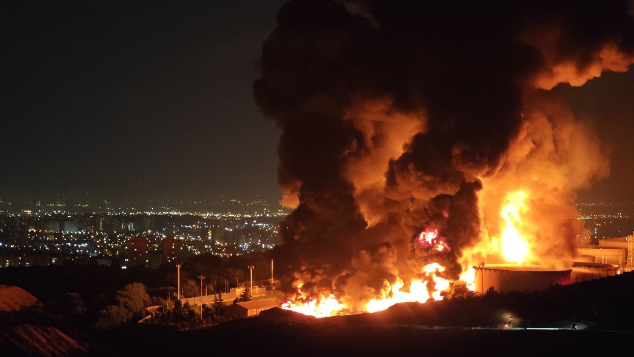 Oil field on fire in Iran after Israeli bombing.