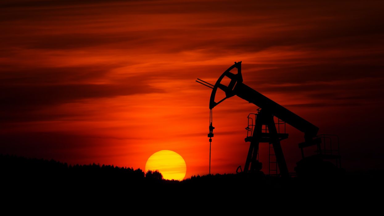 Oil rig at sunset.