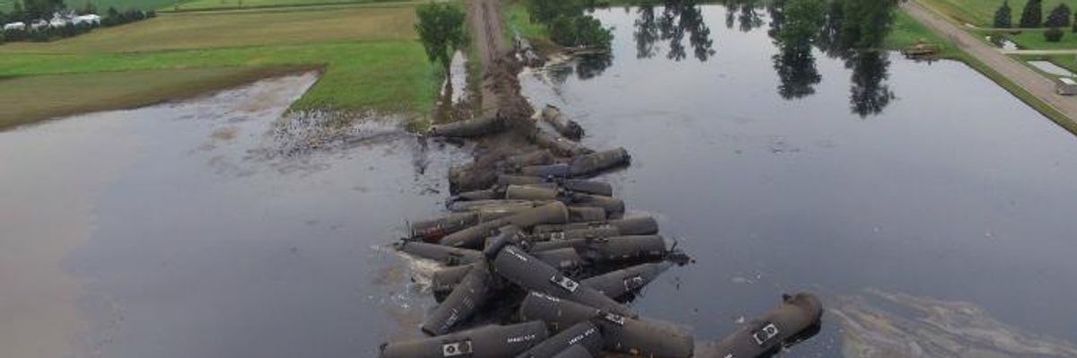 'We Don't Know... How Bad It Is': 31-Car Oil Train Derails Into Iowa Floodwaters