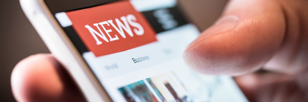 Online news in mobile phone.