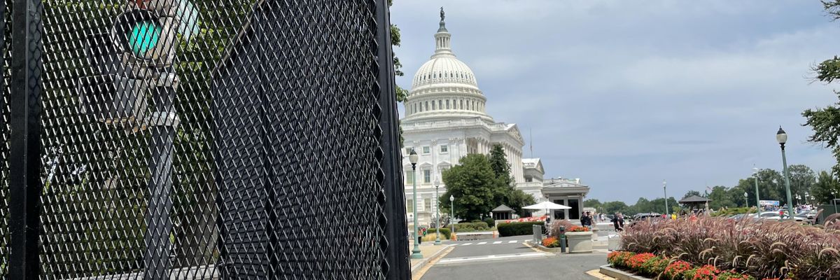 Open gate in D.C. fence.