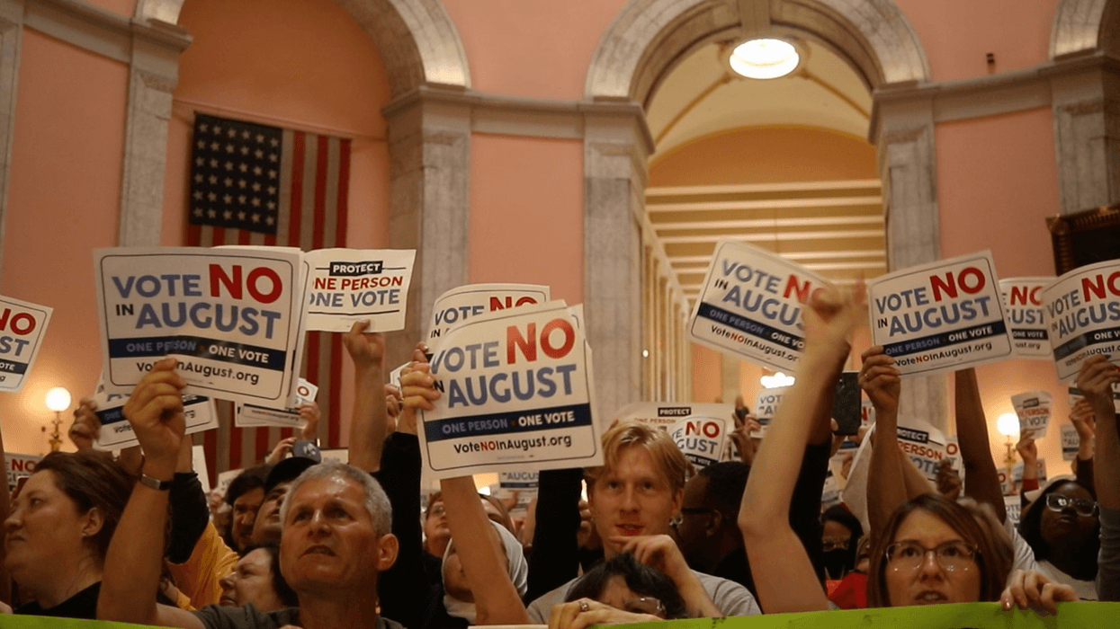 Opponents of Issue 1 hold a demonstration