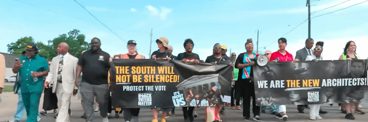 Organizers march across the Edmund Pettus Bridge in Selma, Alabama