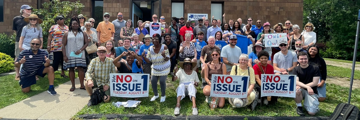 Organizers pose for a photo