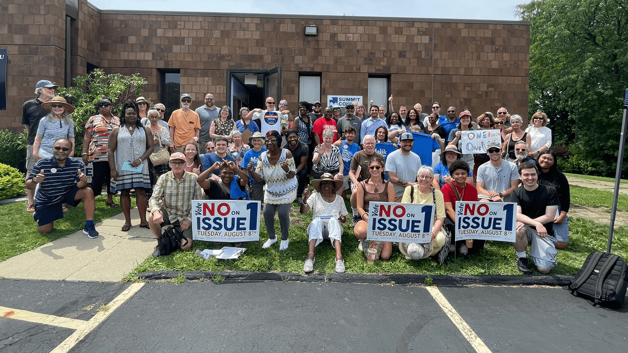 Organizers pose for a photo