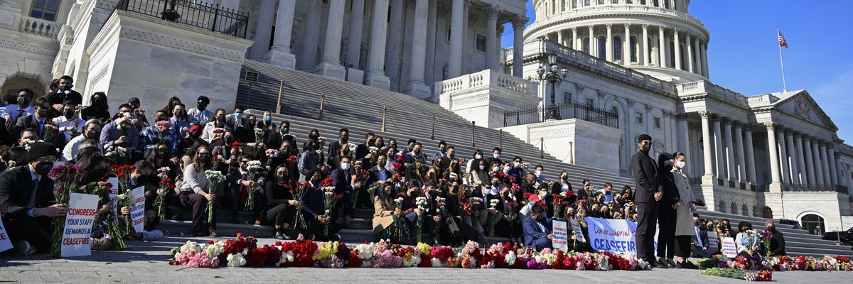 Over 100 congressional staffers demand a Gaza cease-fire outside the U.S. Capitol.