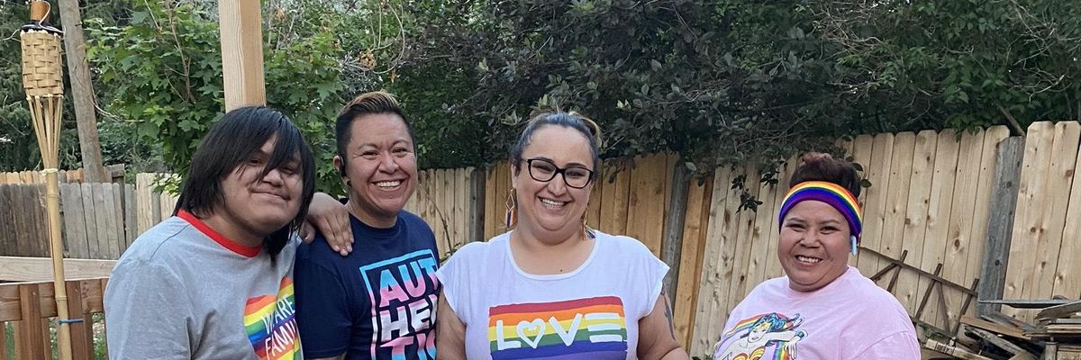 Paid Family Leave campaigners with sign that says "Paid Leave for All"