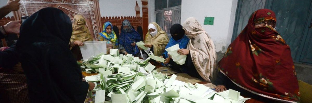 Pakistani election workers count ballots