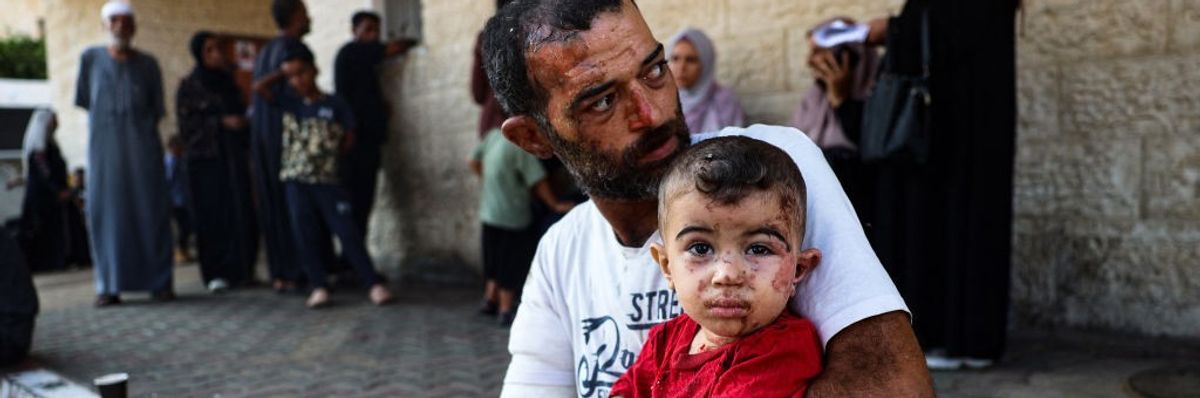 Palestinian Ahmad Yunis and his three-year-old son, Sami