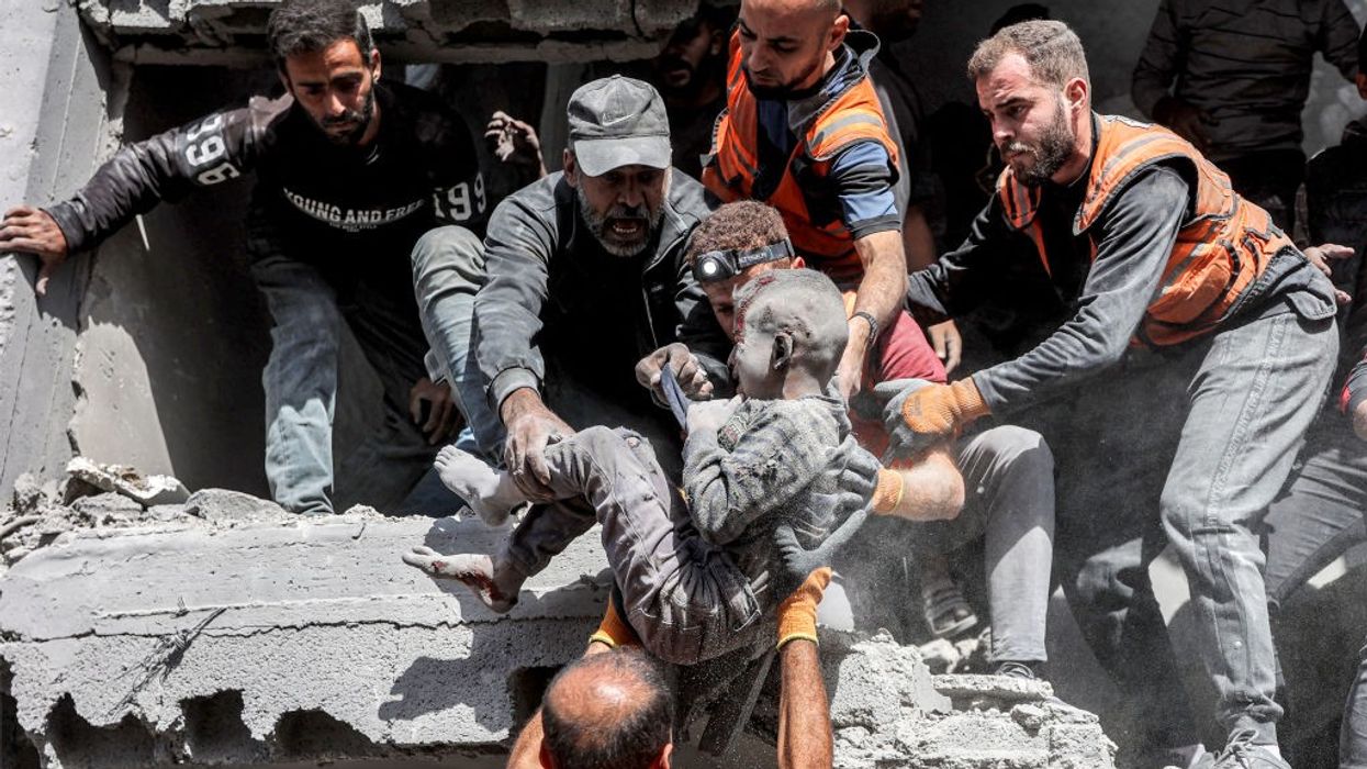 Palestinian child removed from rubble