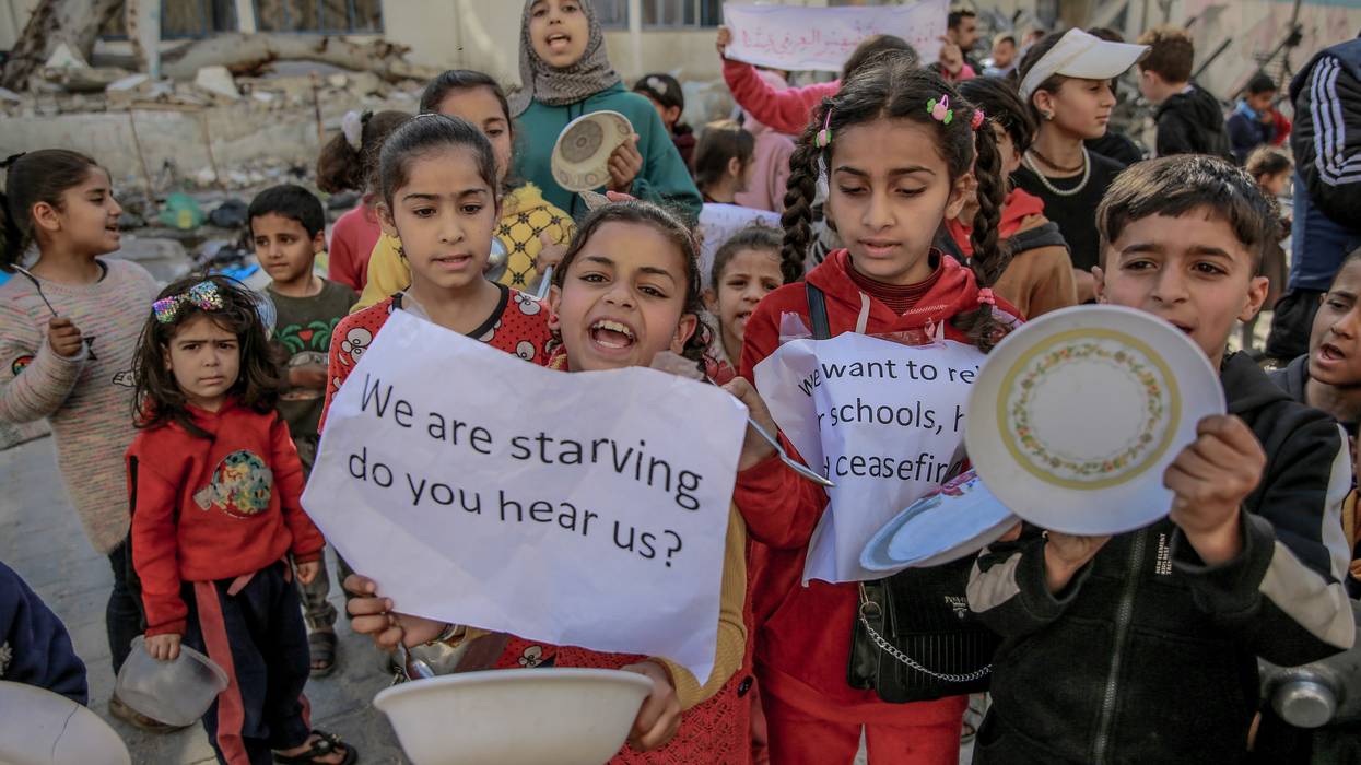 Palestinian children protest against food shortages in Gaza amid Israeli attacks