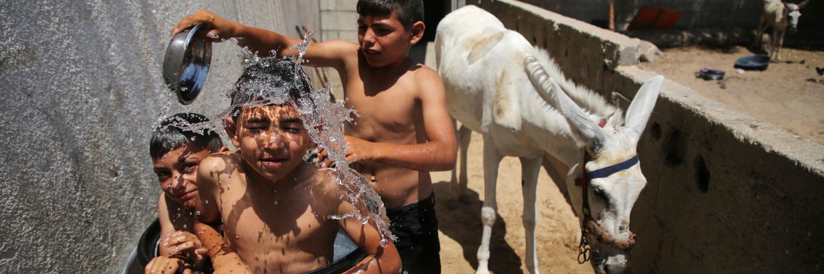 Palestinian children shower