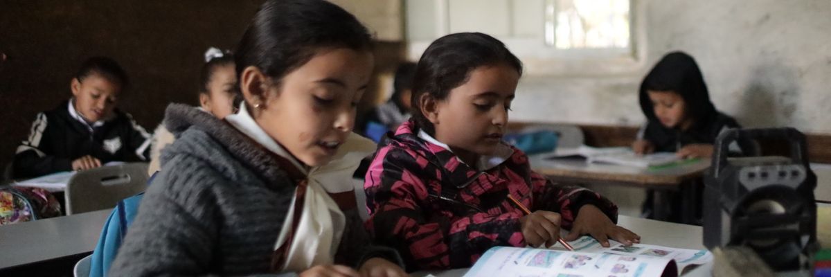 Palestinian children studying in village of Al-Khan Al-Ahmar