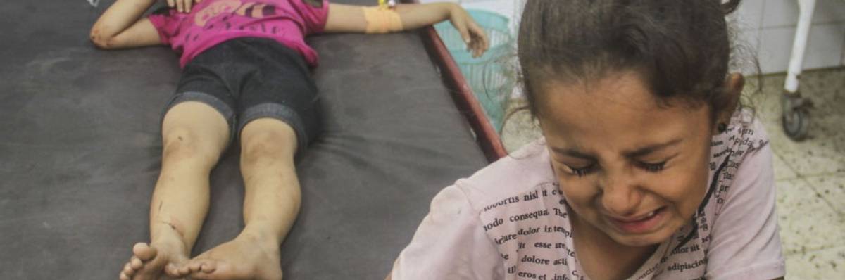 Palestinian children who were wounded in an Israeli army attack on Jabalia refugee camp