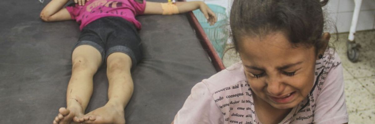 Palestinian children who were wounded in an Israeli army attack on Jabalia refugee camp