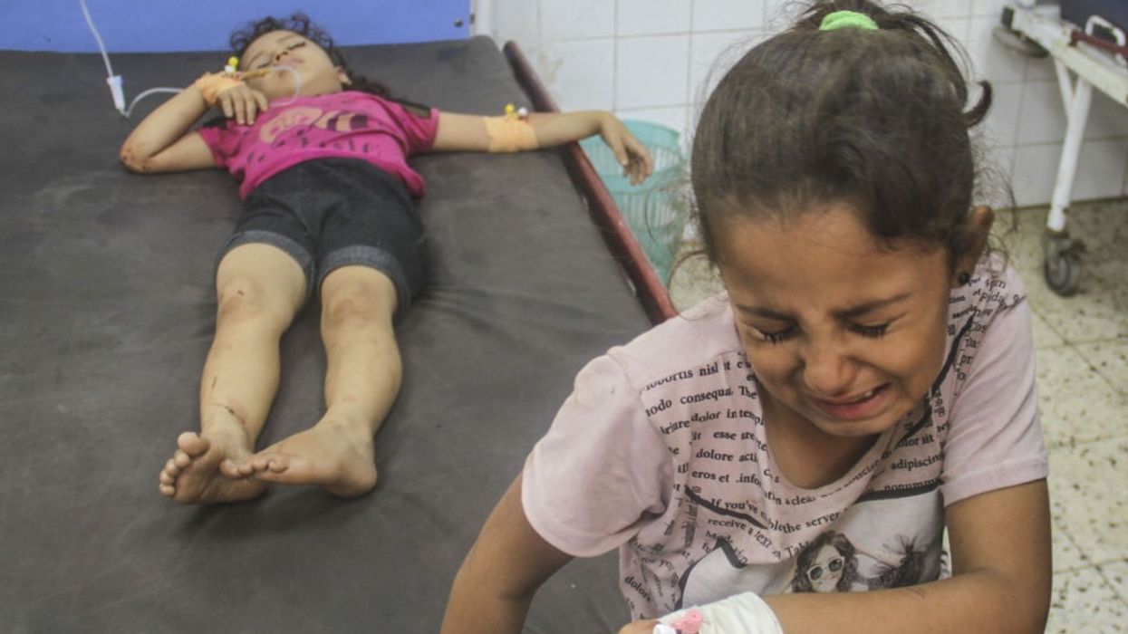 Palestinian children who were wounded in an Israeli army attack on Jabalia refugee camp