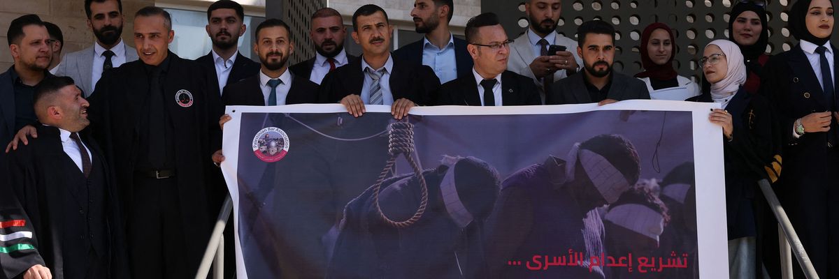 Palestinian lawyers protest against a proposed Israeli death penalty law