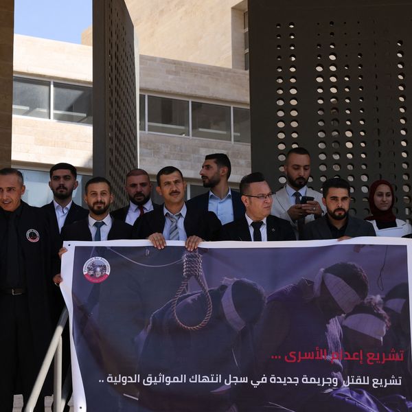 Palestinian lawyers protest against a proposed Israeli death penalty law
