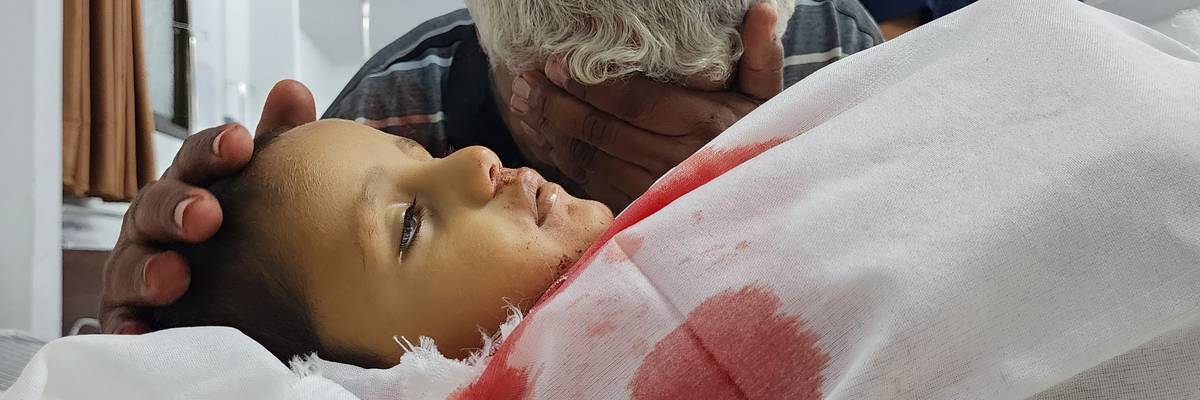 Palestinian man grieves child killed in Rafah bombing.