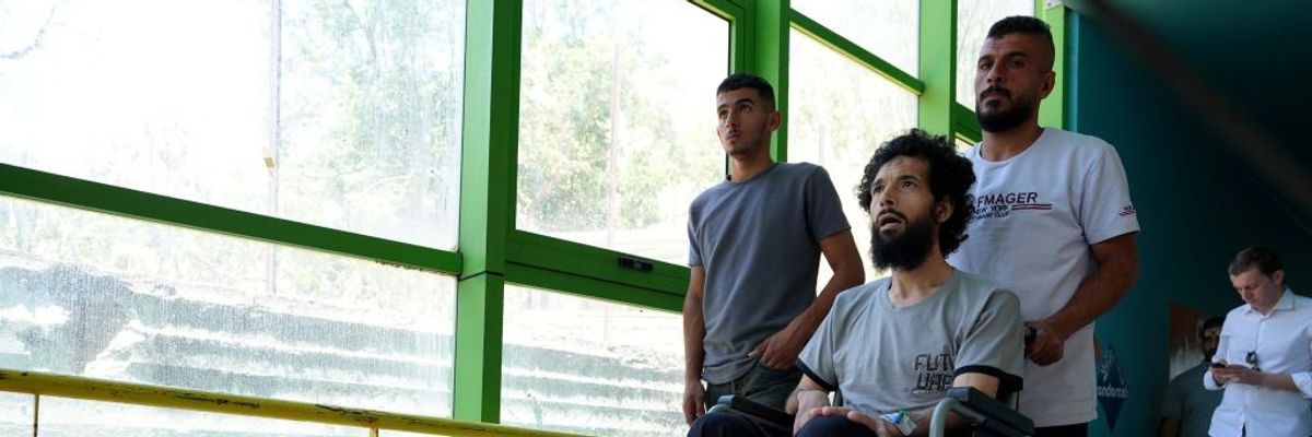 Palestinian man in wheelchair is taken for treatment