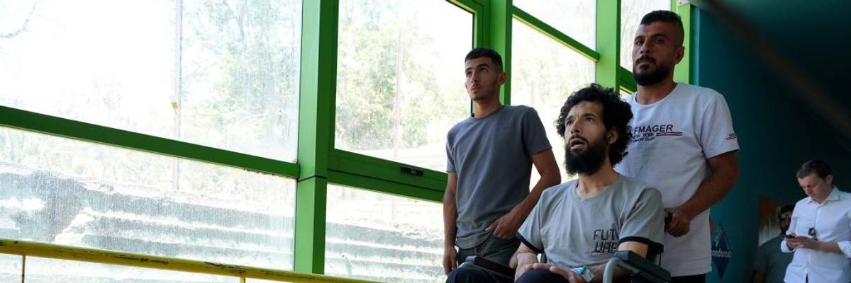 Palestinian man in wheelchair is taken for treatment