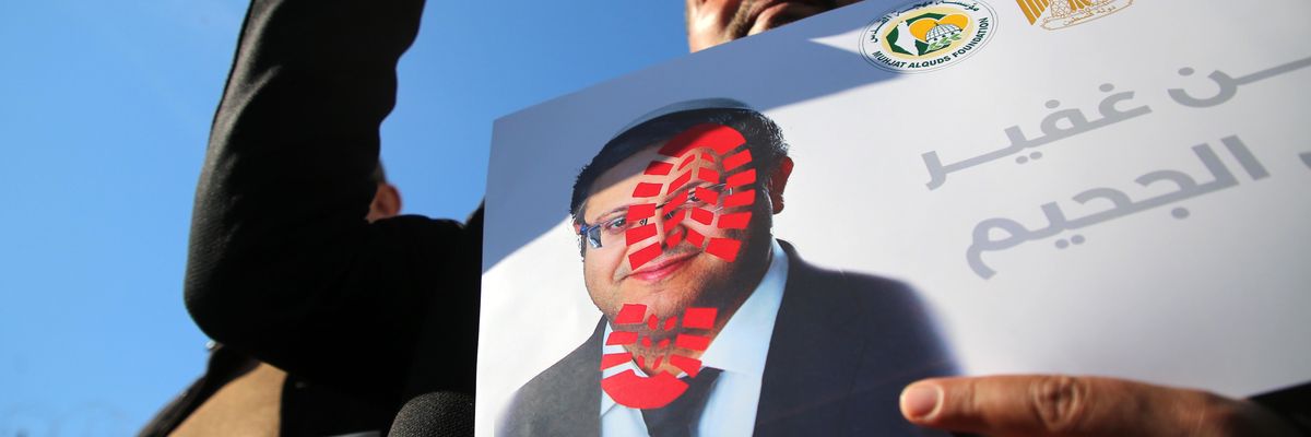 Palestinian takes part in a demonstration against Israeli far-right Minister of National Security Itamar Ben-Gvir