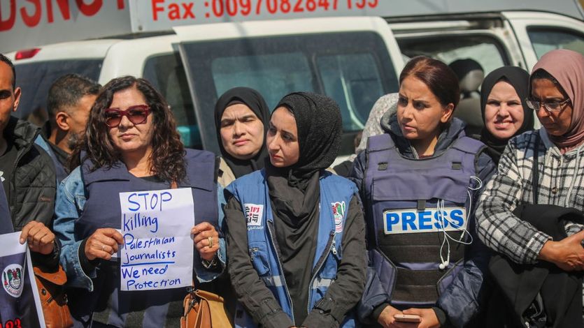 Palestinian women journalist say, "Stop Killing Palestinian Journalists. We Need Protection." 