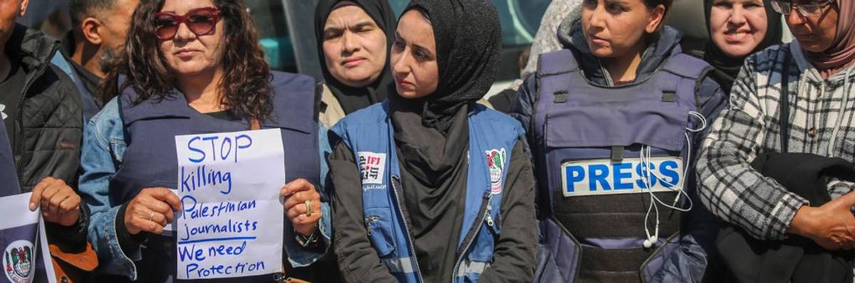 Palestinian women journalist say, "Stop Killing Palestinian Journalists. We Need Protection."