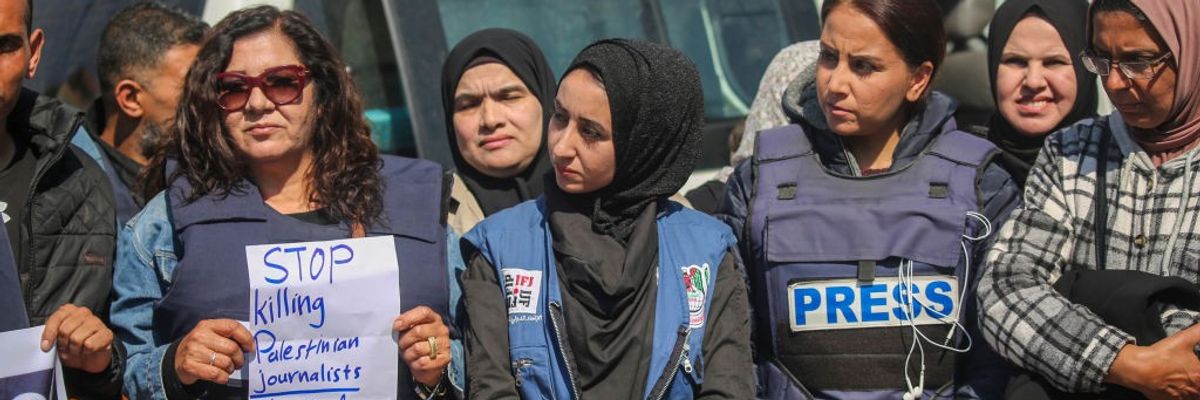 Palestinian women journalist say, "Stop Killing Palestinian Journalists. We Need Protection."