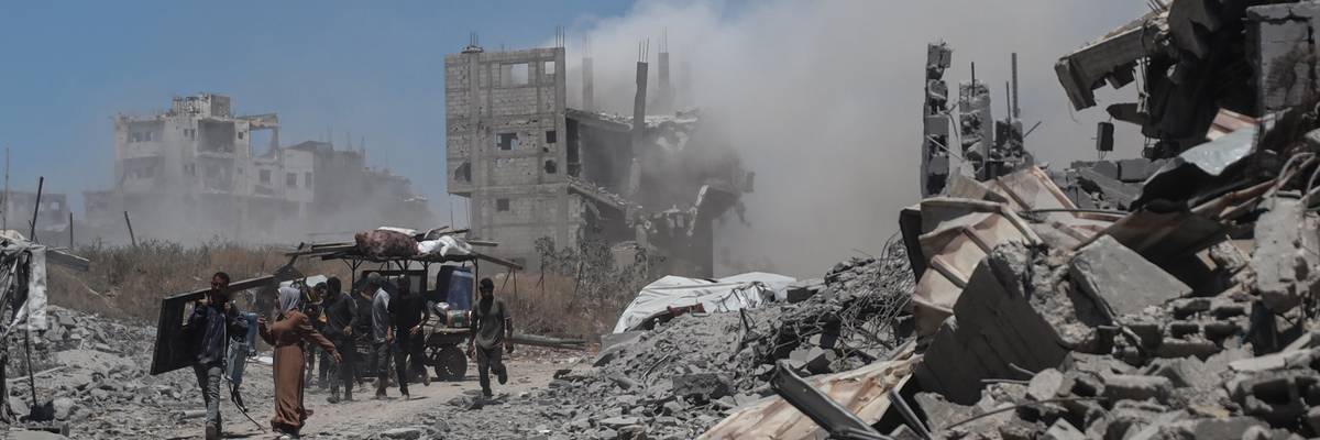 Palestinians are seen returning to their homes in Gaza City, Gaza