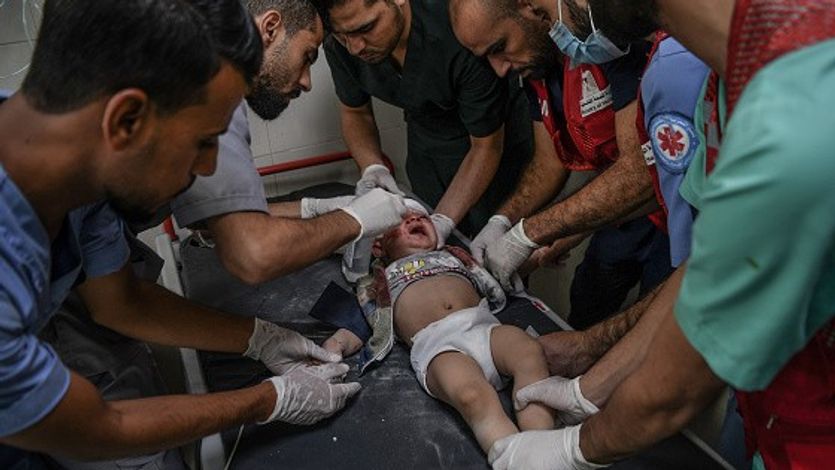 Palestinians attend injured baby in Al-Nasir Hospital  in Khan Yunis, Gaza