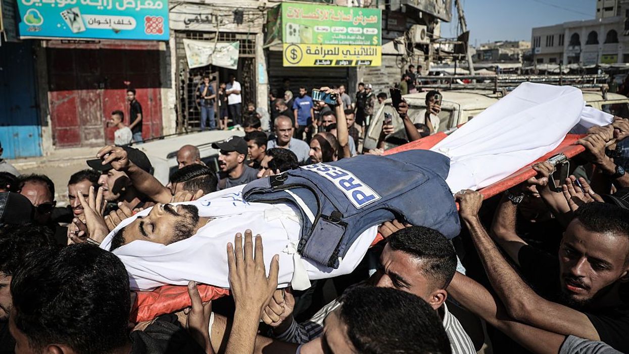 Palestinians attend the funeral of journalist Saleh al-Jafarawi