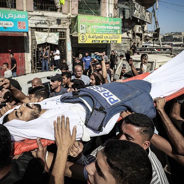 Palestinians attend the funeral of journalist Saleh al-Jafarawi