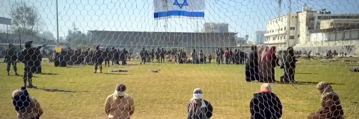 Palestinians blindolded and on their knees in Israeli captivity in Gaza's Yarmouk Stadium.