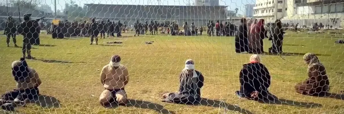 Palestinians blindolded and on their knees in Israeli captivity in Gaza's Yarmouk Stadium.