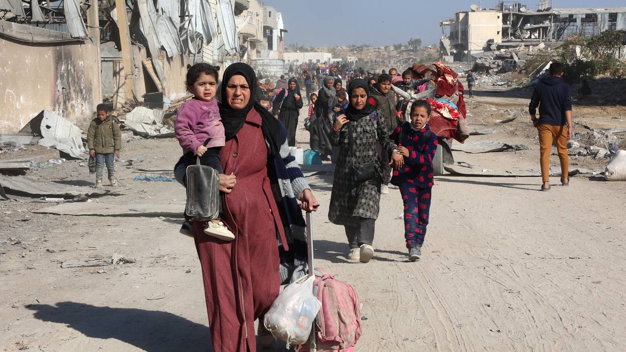 Palestinians, displaced from Beit Lahia, arrive in Jabalia in the northern Gaza Strip