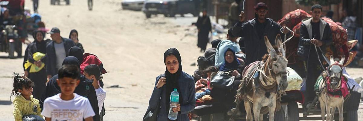 Palestinians flee Rafah in Gaza on foot and donkey cart