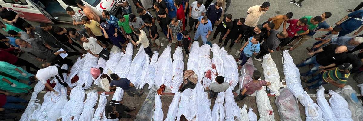 palestinians killed by israel are wrapped in shrouds