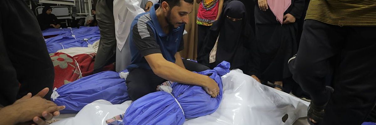 Palestinians mourn dead relatives killled by Israeli strikes