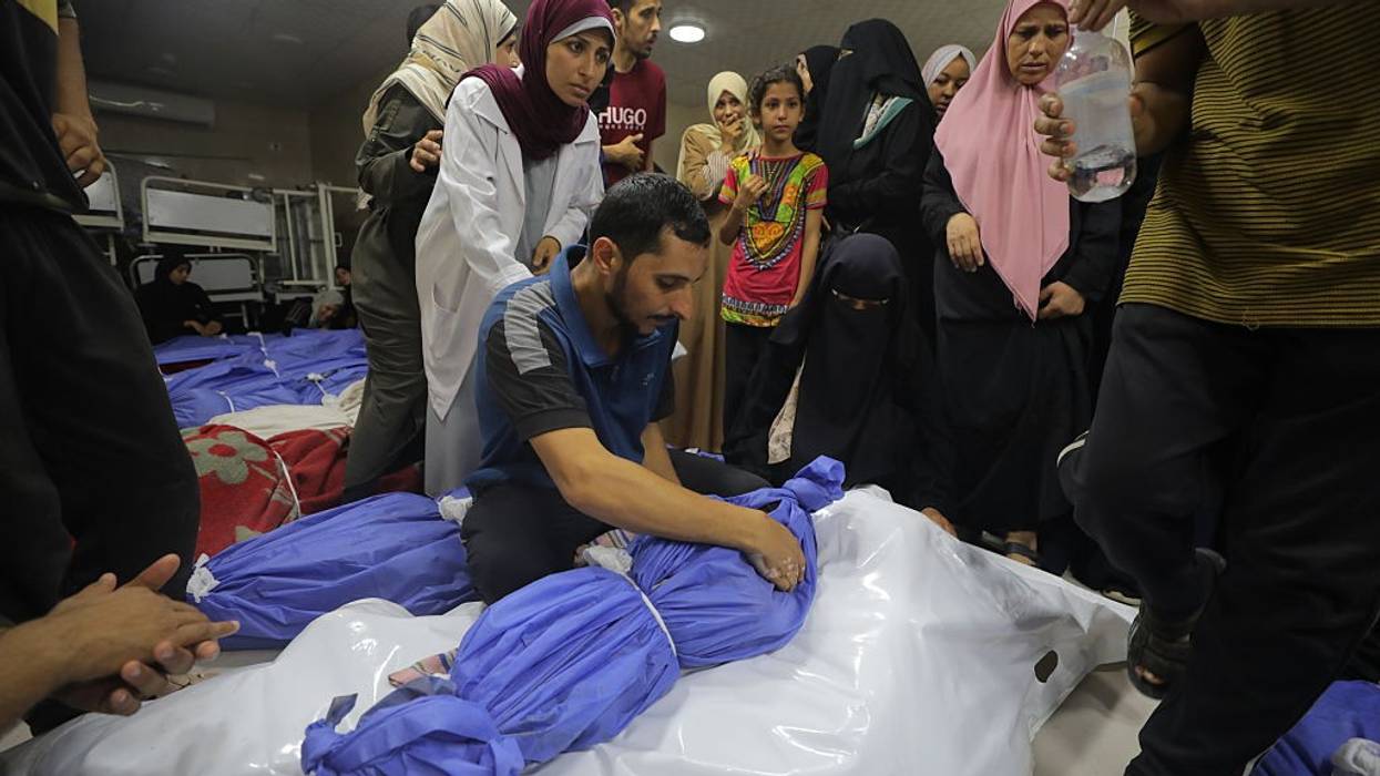 Palestinians mourn dead relatives killled by Israeli strikes