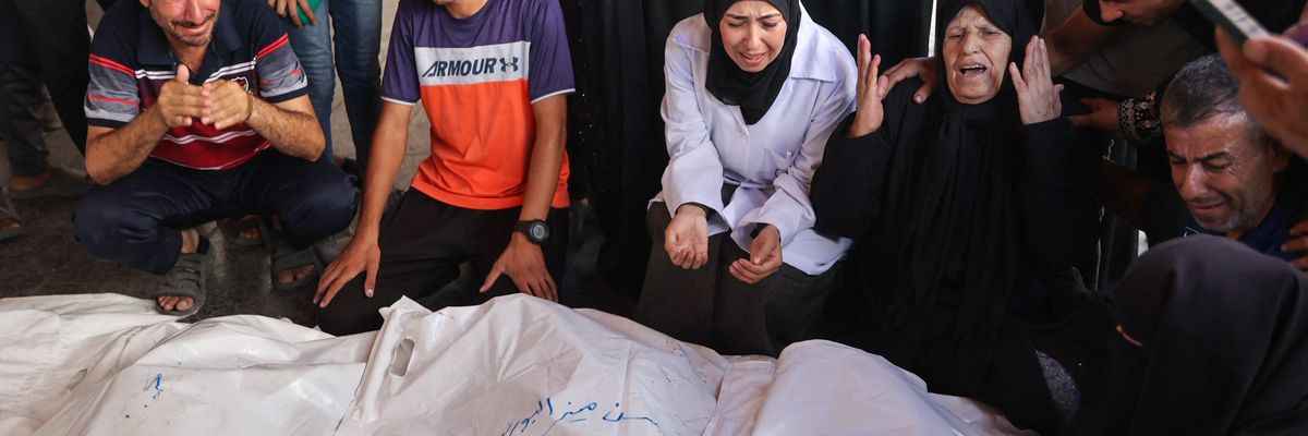 Palestinians mourn family members killed by Israeli airstrike