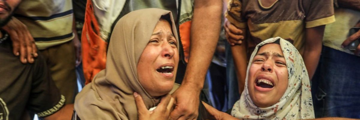 Palestinians mourn in Gaza.