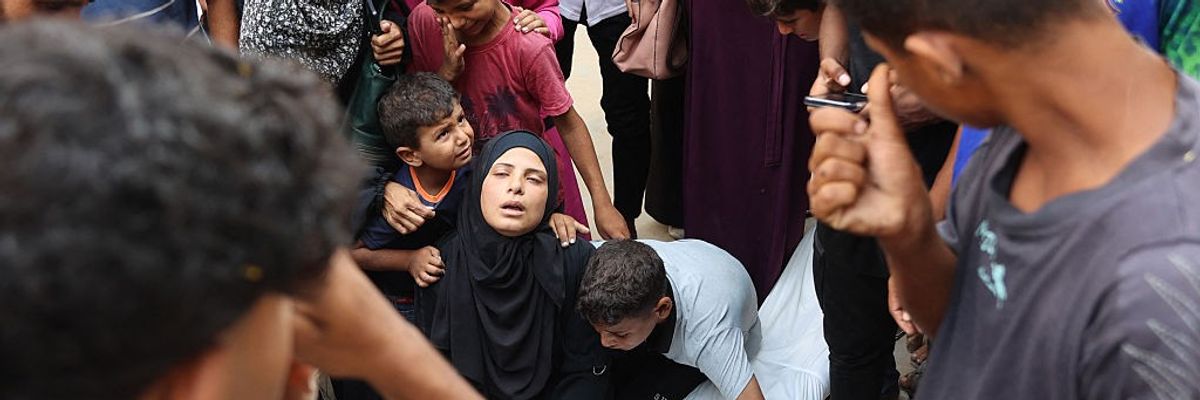 Palestinians mourn victims killed in an IDF strike
