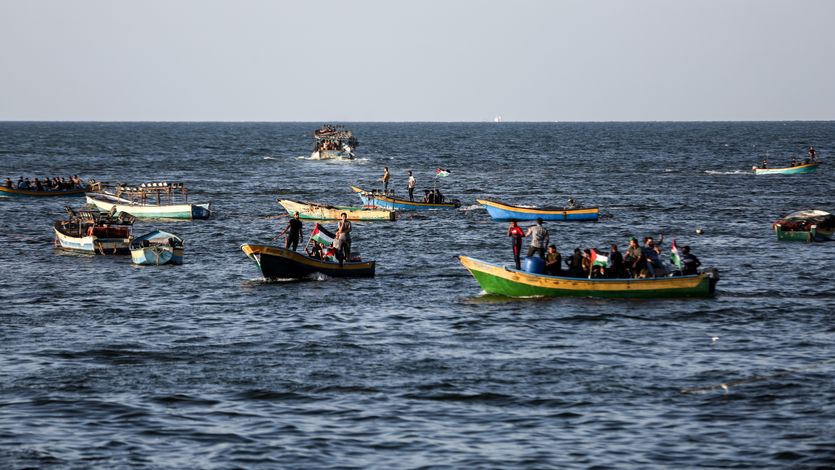 Palestinians protest in boats off Gaza coast.